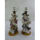 A pair of Augustus Rex figural candlesticks, the lady and gentleman in 18th century costume, A/F