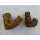 Two early 20th century Bavarian wooden pipe bowls, carved with hunting scenes