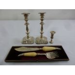 A pair of mid 18th century style silver table candlesticks, a Kiddush cup and a cased set of fish