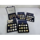 Five trays of commemorative coins in presentation capsules to include proof silver, some with
