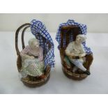 A pair of Meissen style figurines of a cobbler and seamstress