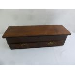 A late 19th century mahogany two drawer glove box with hinged cover, A/F