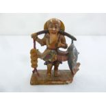 A late 19th century Oriental carved stone figurine of a fisherman, A/F 15cm (h)