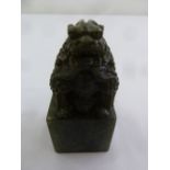 A Chinese soapstone seal with a dog of foe carved finial
