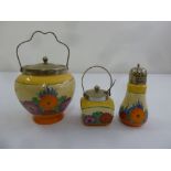 Clarice Cliff Bizarre biscuit barrel, jam jar and sugar sifter all with silver plated mounts