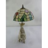 Charles Jonchery an early 20th century silvered bronze table lamp with a Tiffany style shade