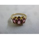 9ct yellow gold three stone tourmaline ring, approx total weight 3.1g