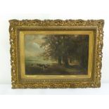 A Victorian framed oil on canvas of cattle by a lake, 41.5 x 64.5cm