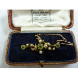 A Victorian gold peridot and seed pearl brooch, tested 15ct, approx total weight 3.3g