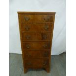 An Edwardian rectangular mahogany six drawer chest of drawers on four bracket feet