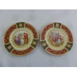 Two Vienna plates decorated with classical themes and gilded borders, marks to the base