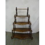 A five tier mahogany rectangular whatnot with barley twist supports