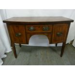 A Regency rectangular desk with brass handles on four tapering rectangular legs