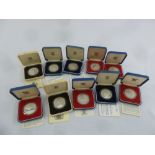 Ten silver proof coins in fitted cases, to include COAs