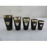 A graduated set of five silver mounted horn beakers, Birmingham circa 1900