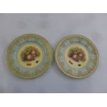 Two Aynsley decorative plates decorated with fruits within gilded borders, marks to the base