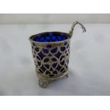 A late 18th century silver bonbon basket, cylindrical scroll pierced sides with detachable blue