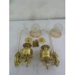 A pair of Victorian style brass wall lights converted to electric