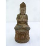 A Chinese 19th century carved wooden Buddha