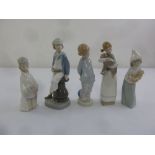 Five Lladro figurines of children in various poses