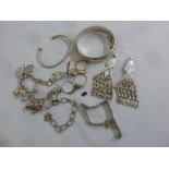 A quantity of costume jewellery to include silver bangles, rings and bracelets (12)