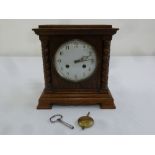 Oak cased mantle clock two train movement, to include key and pendulum