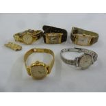 A quantity of wristwatches to include a ladies Omega 18ct gold watch and strap, a 9ct Mappin Art