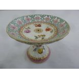 A Meissen early 20th century fruit stand with pierced gallery on raised stand, marks to the base,