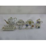 A quantity of Herend porcelain to include a miniature teapot, a toast rack, cups, saucers and a