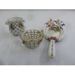 Two Dresden pierced dishes and an Augustus Rex porcelain hand mirror with applied putti figurines