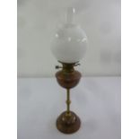 French brass and copper oil lamp with globular glass shade