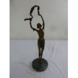 Art Nouveau figurine of a lady in a skimpy costume on circular marble plinth