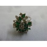 18ct white gold, diamond and emerald cocktail ring