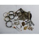 A quantity of costume jewellery to include hat pins, bangles and an item of Masonic interest