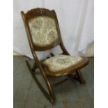 Mahogany campaign chair with upholstered seat and back