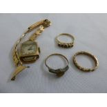 A quantity of gold jewellery three rings and a ladies wristwatch all A/F