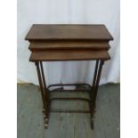 A nest of three rectangular mahogany tables