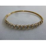 9ct yellow gold bangle set with cubic zircona, approx total weight 4.3g