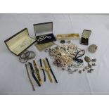 A quantity of costume jewellery to include necklaces, bracelets, bangles, watches and pendants