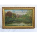 A framed oil on canvas of a country home with children by a lake in the foreground executed in the