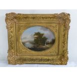 A 19th century framed oil on panel of figures in a country landscape, 26 x 33.5cm