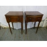 A pair of rectangular mahogany side tables with single drawers on tapering cylindrical feet