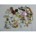 A quantity of costume jewellery to include necklaces, bracelets, brooches and watches