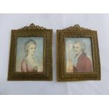 A pair of portrait miniatures in rectangular filigree gilt metal frames