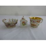 A Vienna hand painted bowl, a Meissen miniature tea caddy and an English tea cup with gilt interior