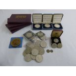 A quantity of GB coins to include coin sets, crowns and proof silver coins