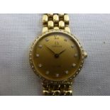 Omega Deville 18ct yellow gold ladies wristwatch with diamond bezel, approx total weight 41.4g