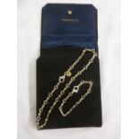 Tiffany & Co. sterling silver and 18ct gold bar link necklace and a matching bracelet