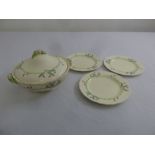 A Wedgwood vegetable dish and cover and three matching plates