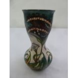 Moorcroft bulbous vase decorated with flowers in the Chinese style, marks to the base, 25.5cm (h)